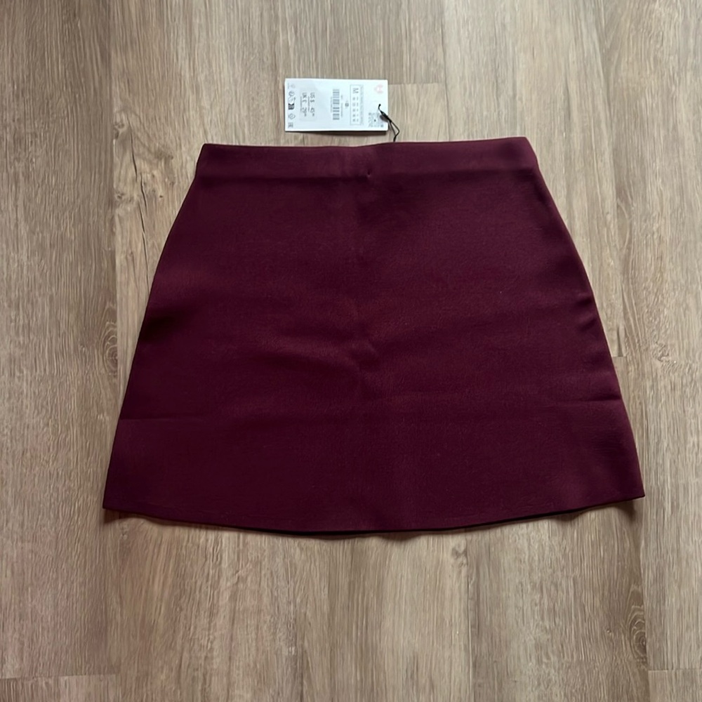 NWT maroon skirt. Size medium